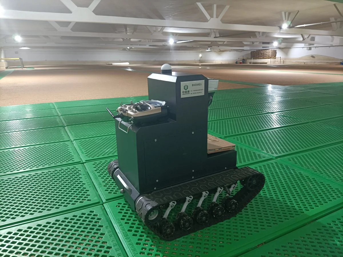 Grain-surface inspection robot inside a storage bin